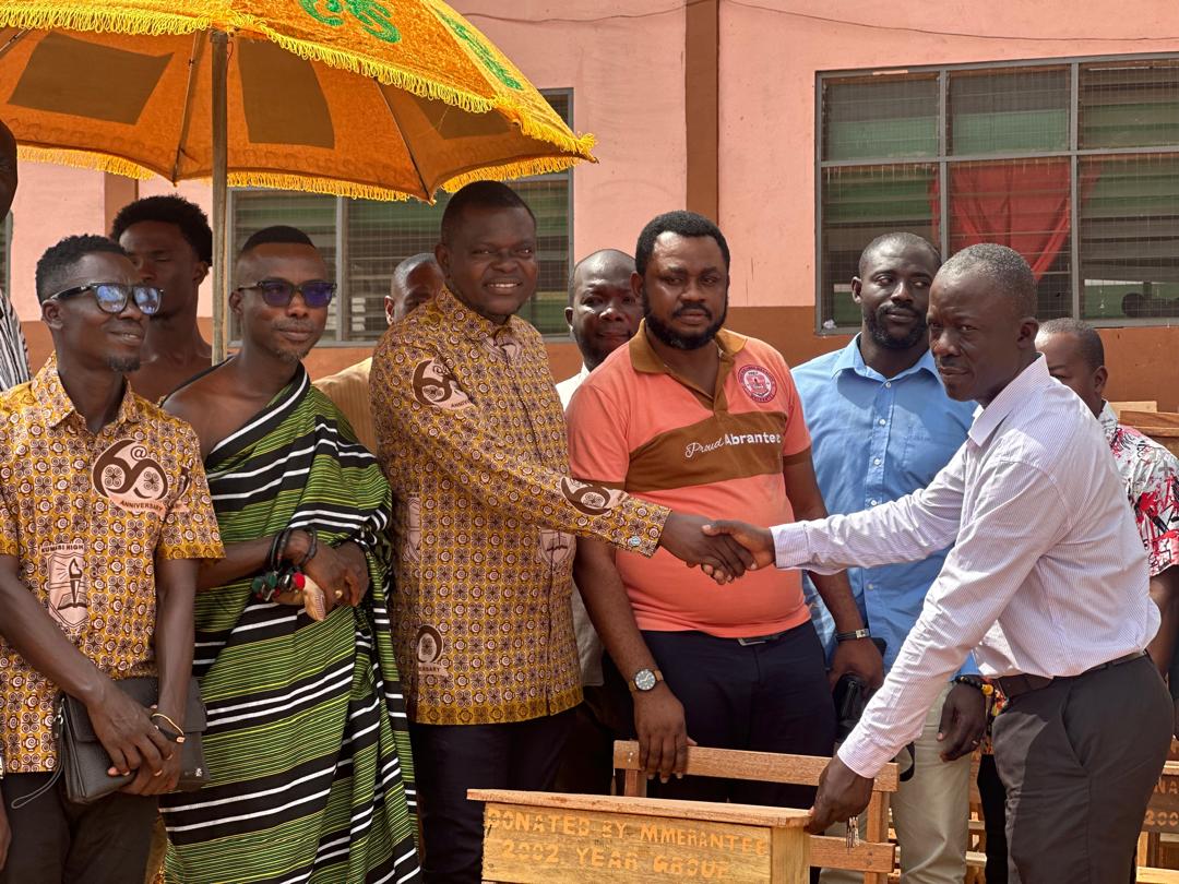 IMG-20251216-WA0323 KUHIS 2002 Group presents 100 desks to headmaster