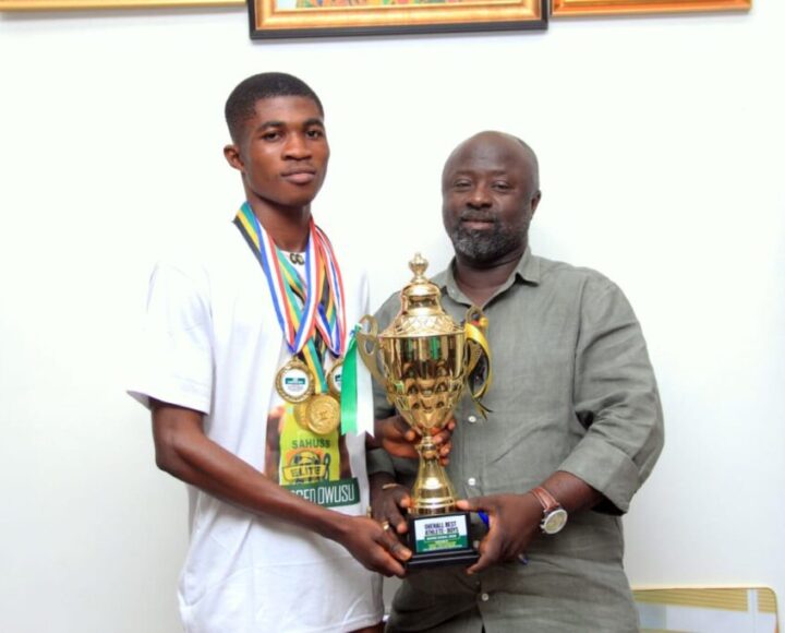 IMG-20260303-WA0181 Suzo Best Athlete presents award to K’si Mayor